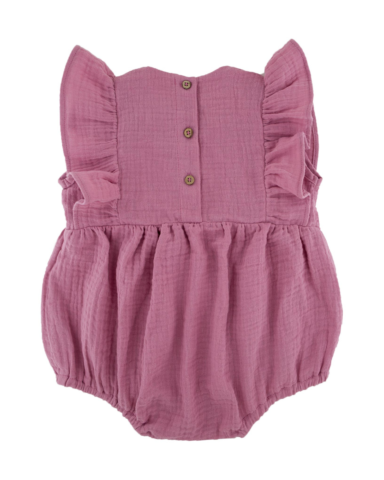 baby girl onesie by Les Vedettes in high quality muslin cotton is shown in blush pink from the rear