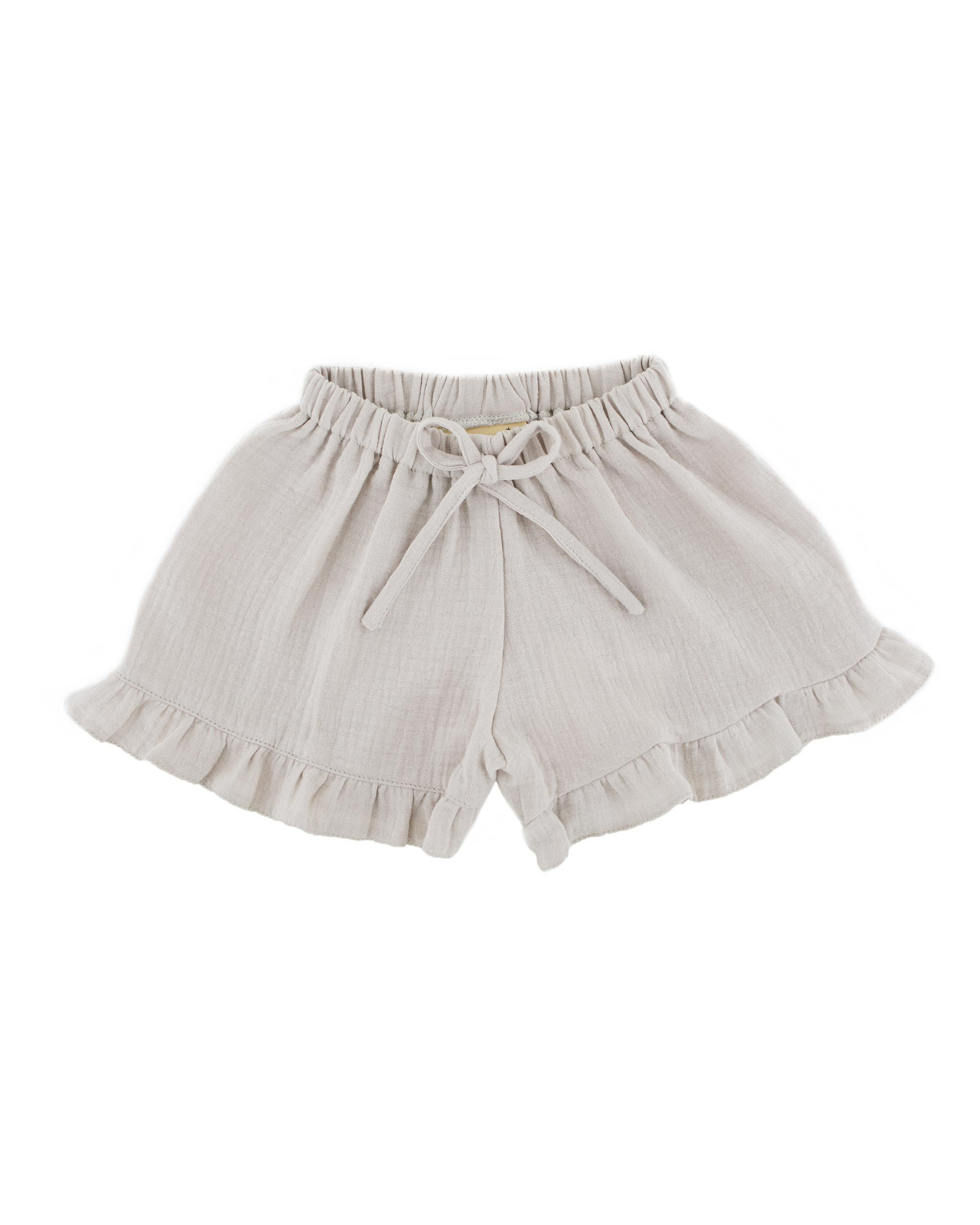 Girls Shorts by Les Vedettes in Muslin Cotton. The shorts are shown in the color Beige.