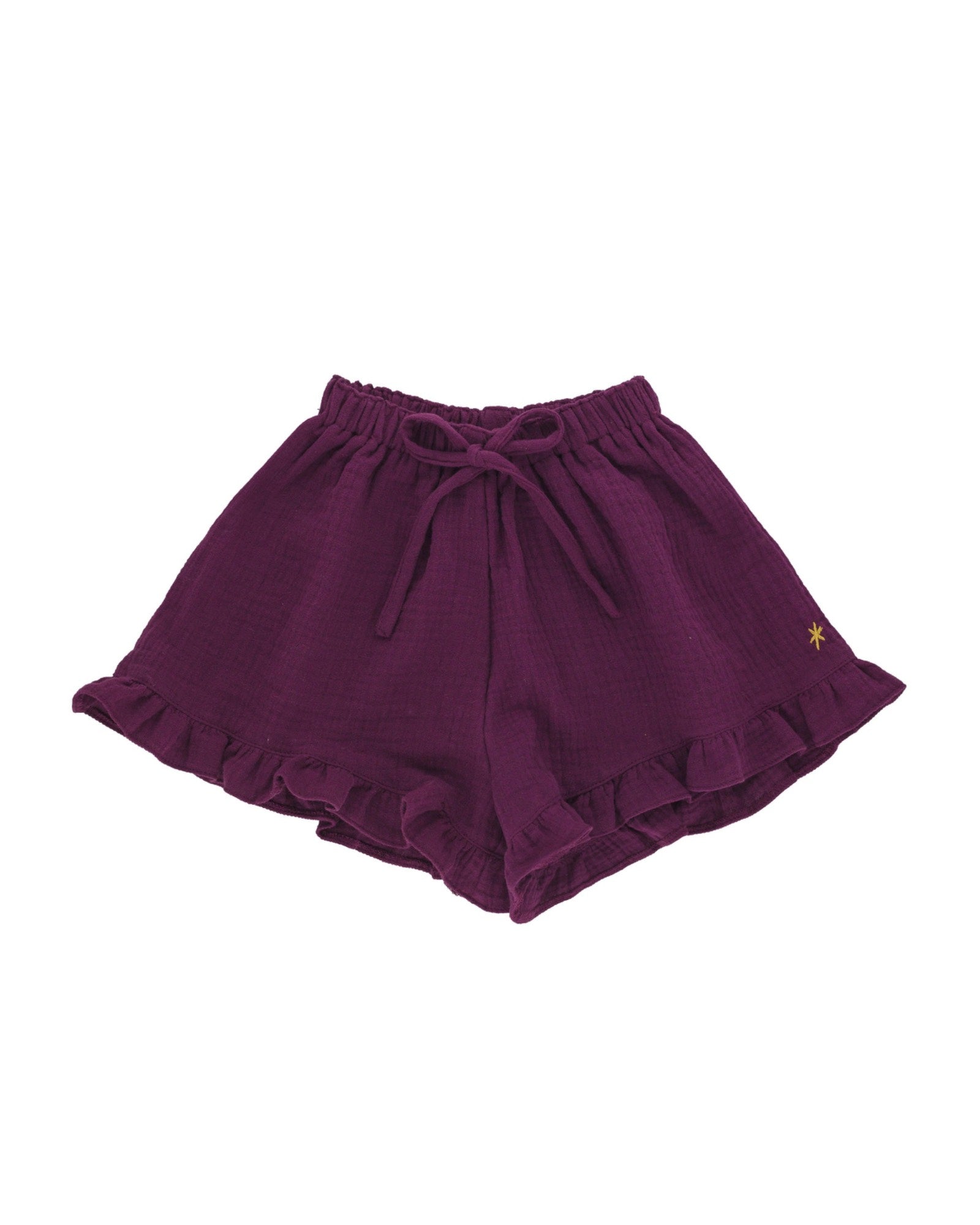 Girls Shorts by Les Vedettes in Muslin Cotton. The Shorts are shown in the color Aubergine.