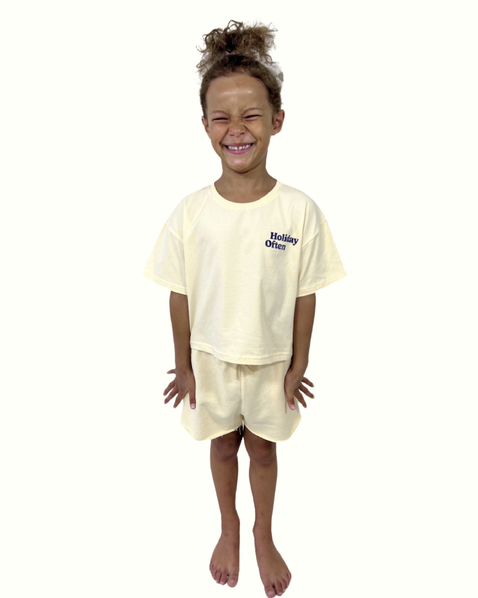 girl model wearing the crop t-shirt holiday often in the color cannoli with the matching cut off jog shorts in cannoli by Cos I Said So