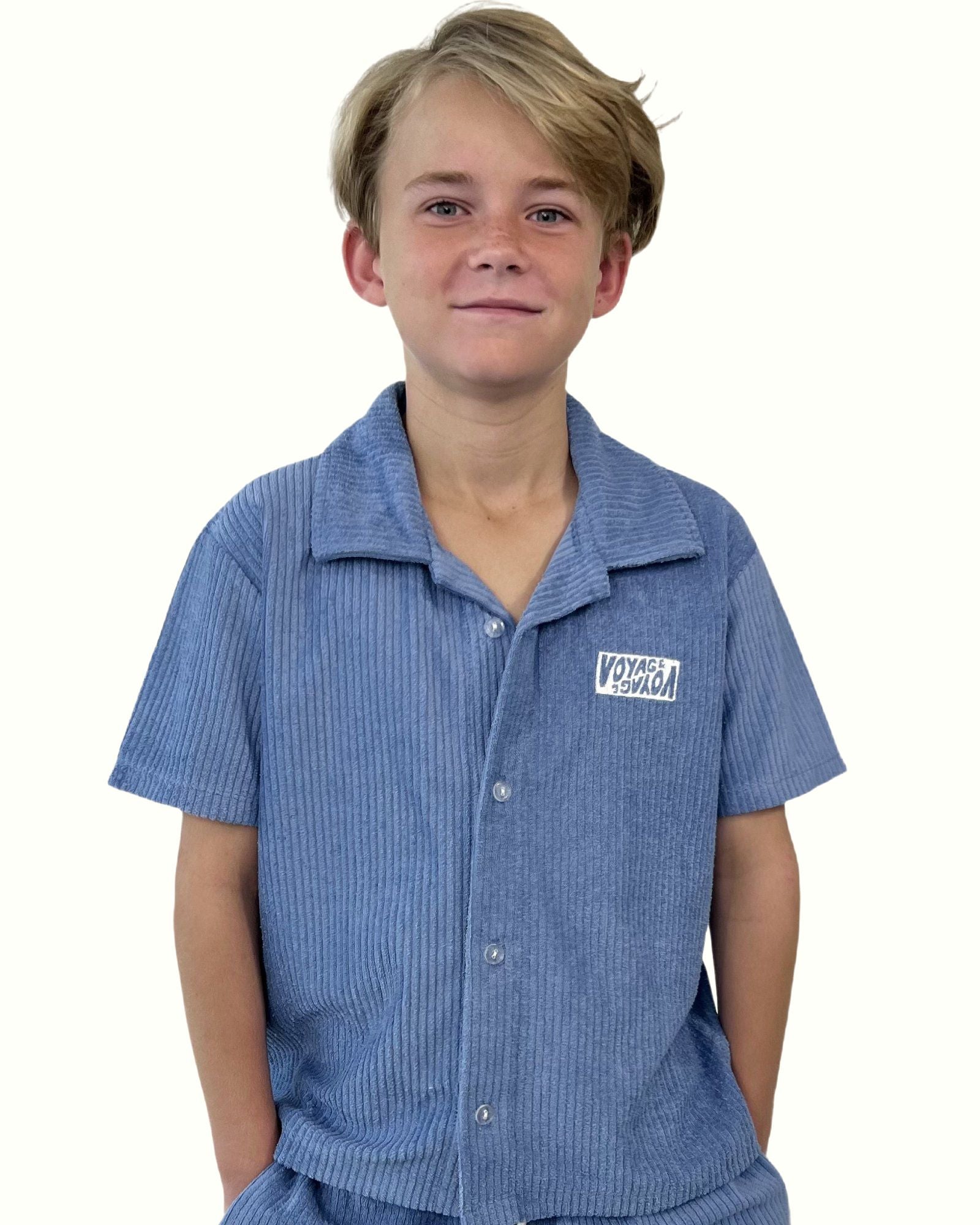 boy model wearing the towel terry shirt by Cos I Said So in blue