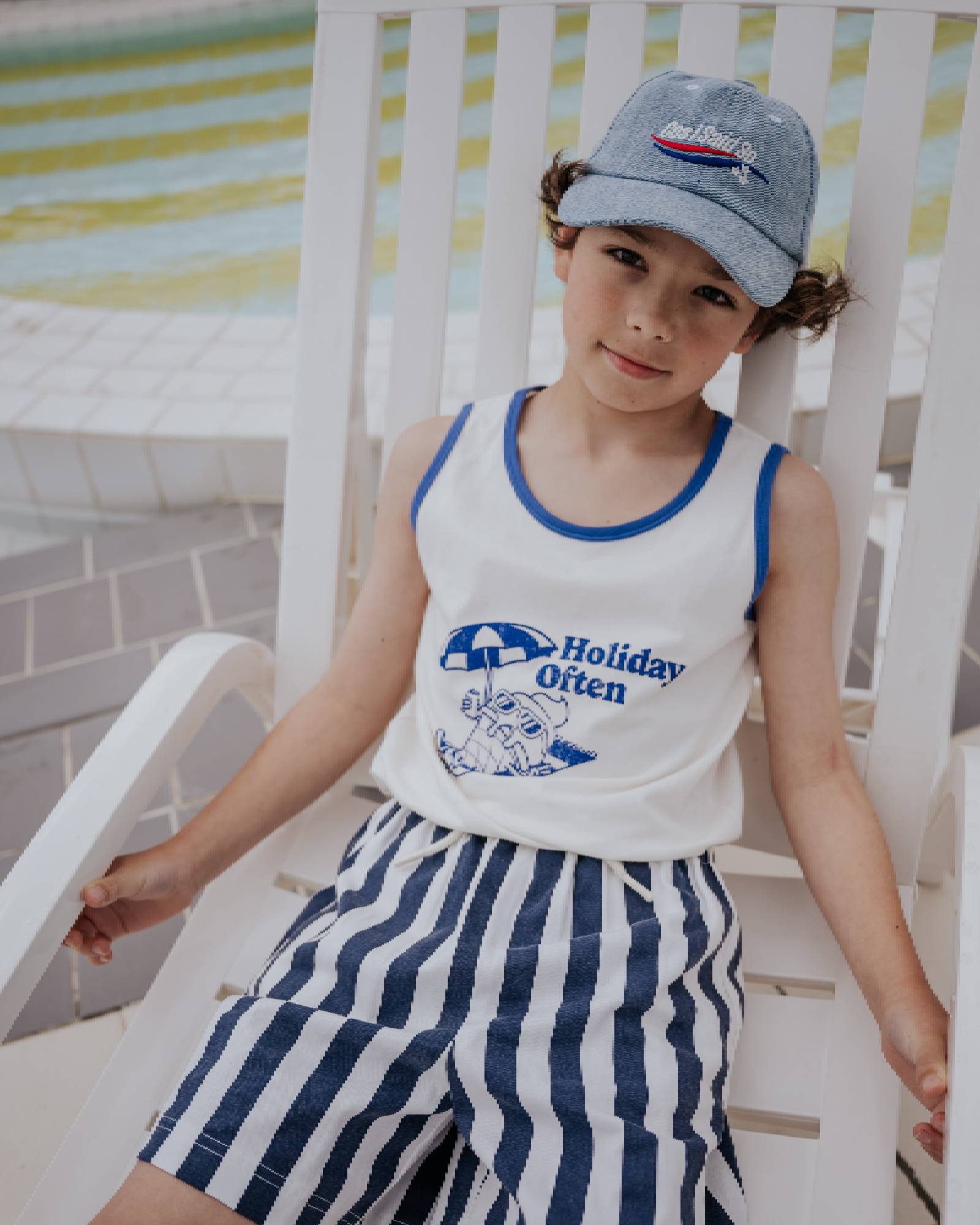 boy model wearing the holiday often tank top