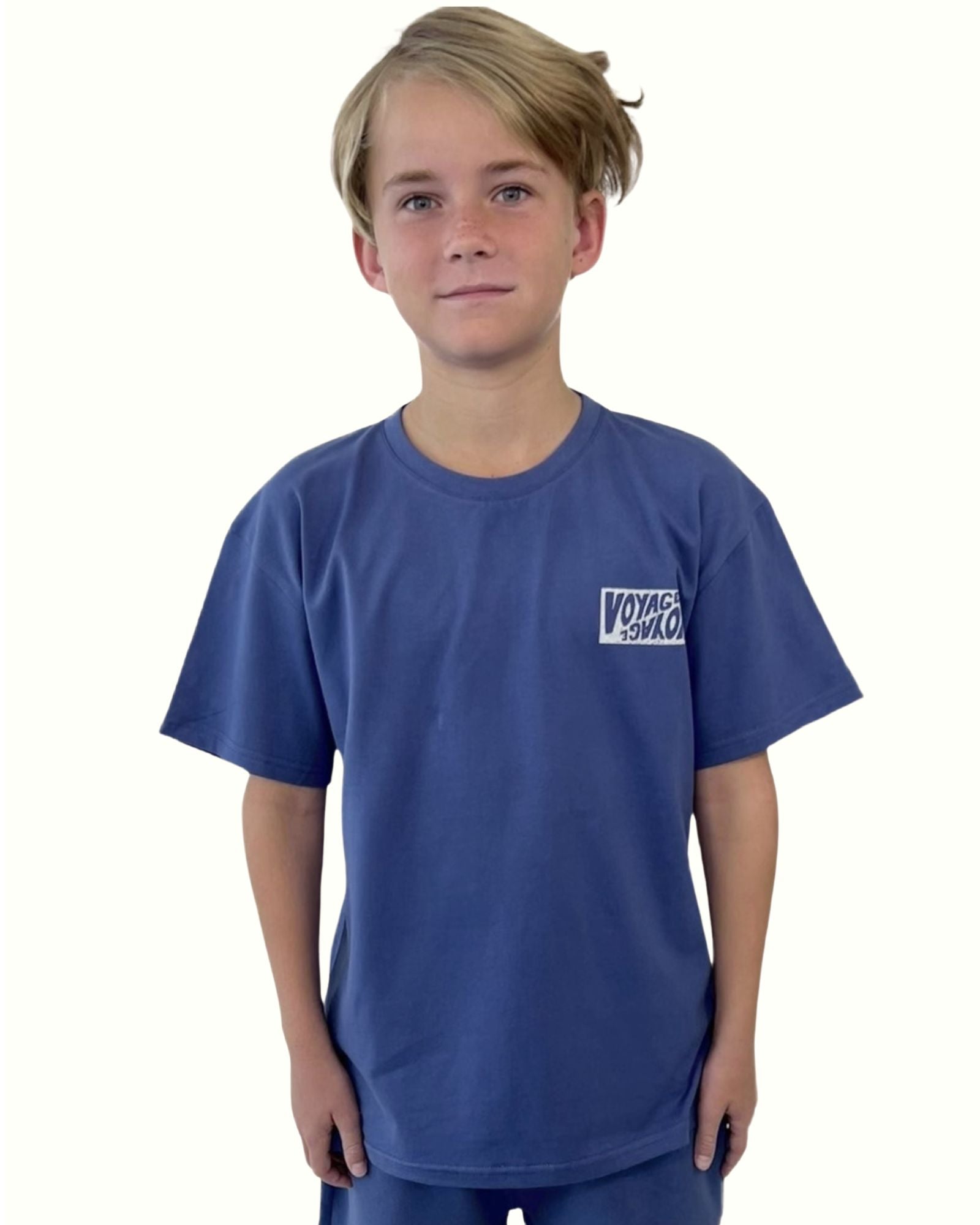 boy model wearing the voyage t-shirt by Cos I Said So in ultramarine blue in the best quality organic cotton, GOTS certified