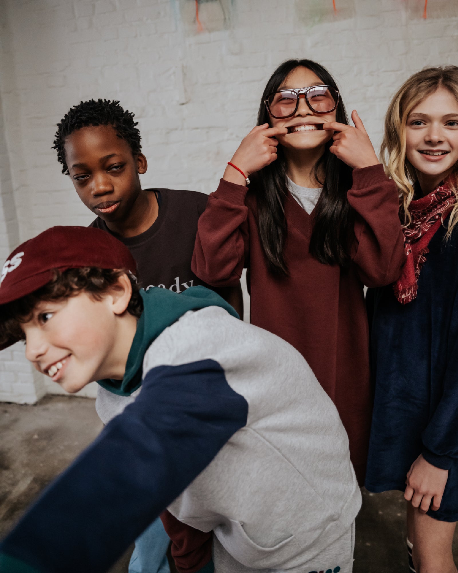 girl model in the middle wearing the v-neck dress