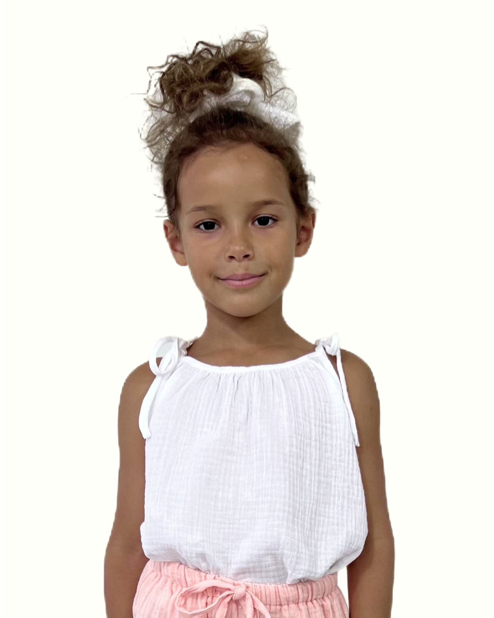 girl model wearing the Miu top by Les Vedettes in white high quality muslin cotton