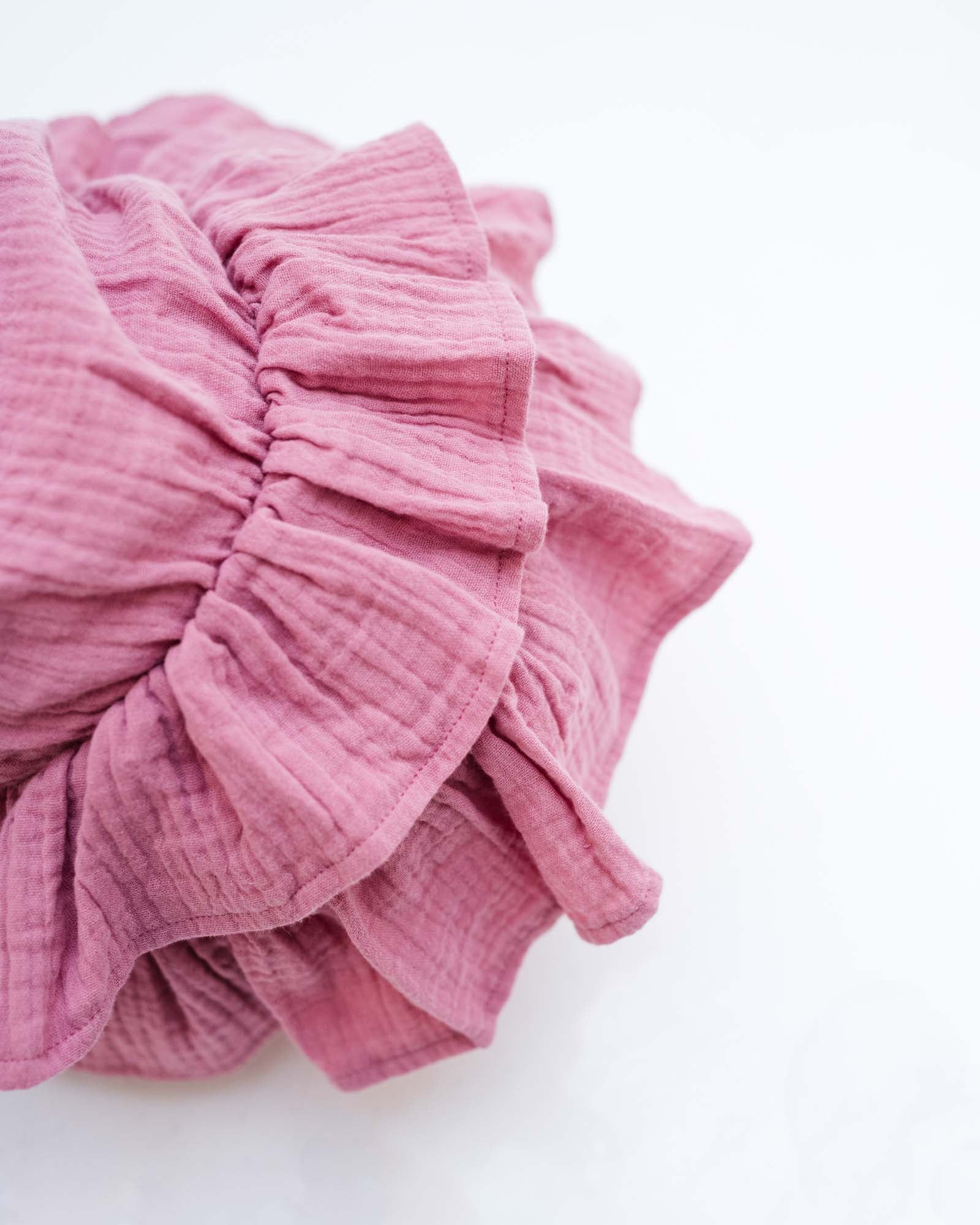 baby girl showing the 2 layers of frills from the back