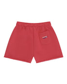 girls cut off jog shorts by  Cos I Said So  in the color poinsettia red with a pocket on the the back