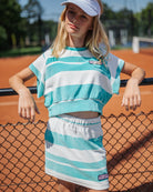 girl model wearing the striped skirt in towel terry organic cotton by cos I said so