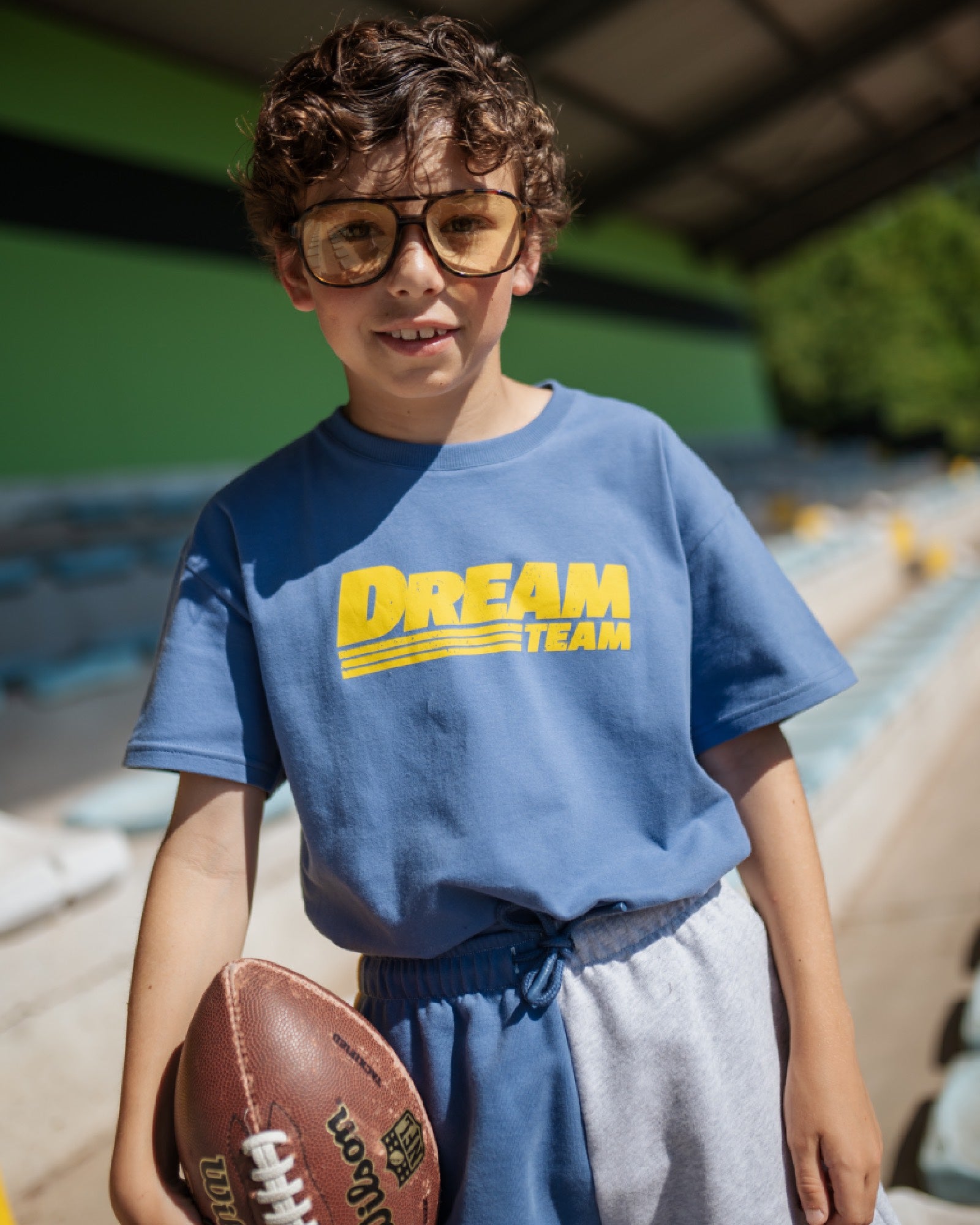 boy model wearing the dream team t-shirt by cos I said so in high quality organic cotton