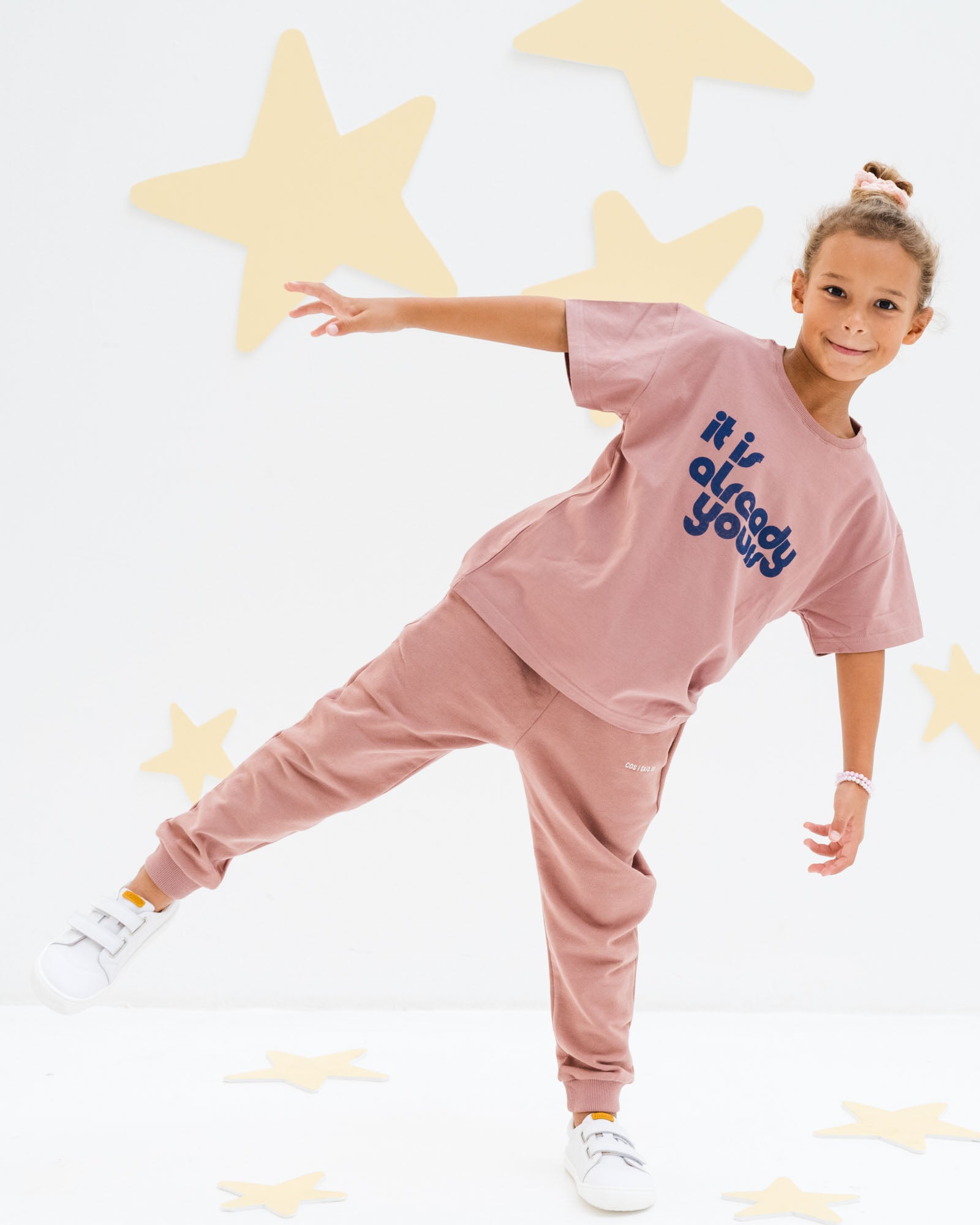 girl model wearing it is already yours t-shirt with matching jog pants in burlwood