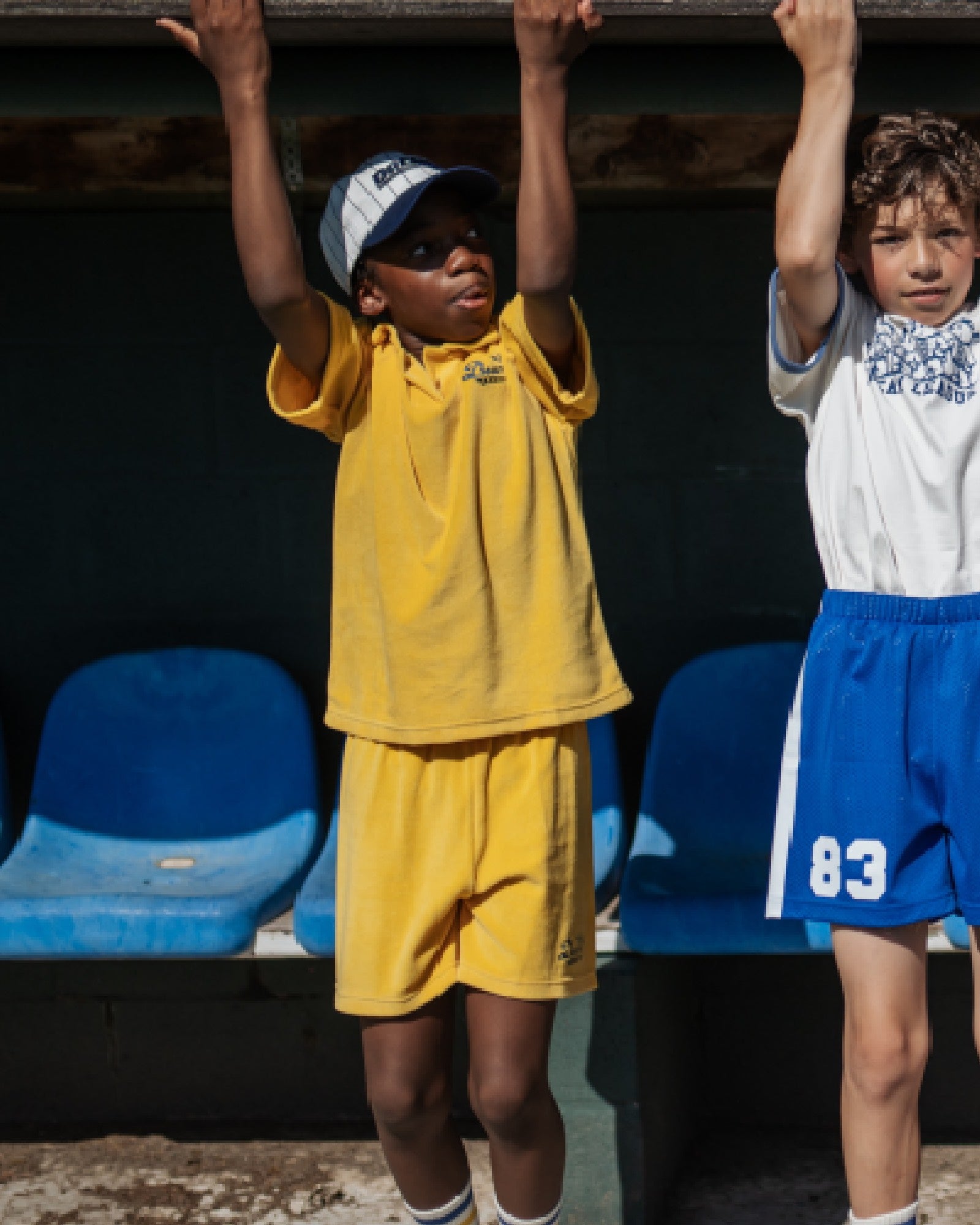 boy model wearing the dream league shorts in organic towel terry by cos I said so