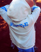 boy model wearing the zip hoodie and the jog shorts in granada sky.