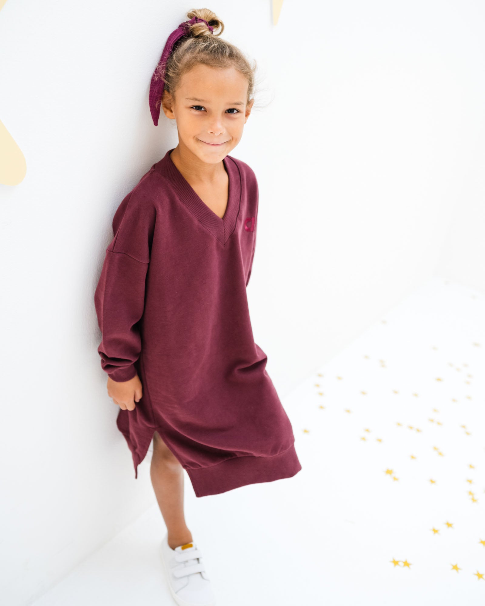 7-year-old girl wearing the V-neck dress in port from Cos I Said So