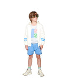 boy model wearing tennis tank top with zip hoodie vedette in off-white and the jog dhorts in granada sky