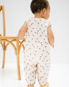 baby boy showing the lois  palms from the back