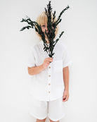 5-year-old boy wearing the raphael shirt with matching julian shorts in white