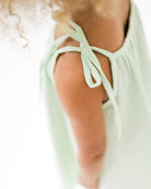 close-up of the straps of the romy dress in mint