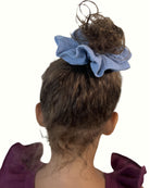girl model showing the scrunchie by Les Vedettes in cloudy blue muslin cotton