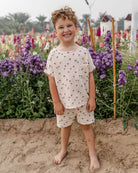 this set comes with an oversized top and matching shorts in palms muslin cotton
