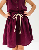 girl model wearing the Sienna skirt in aubergine