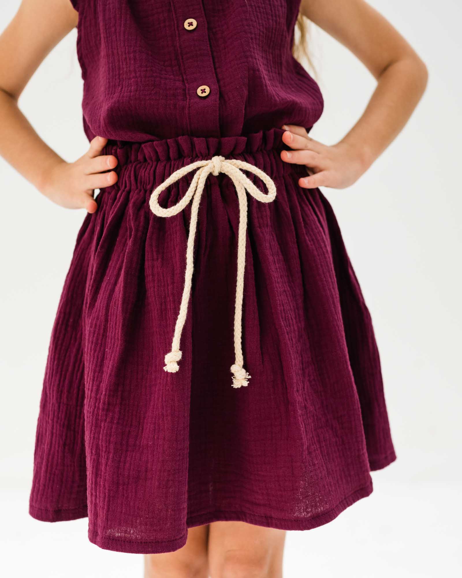girl model wearing the Sienna skirt in aubergine