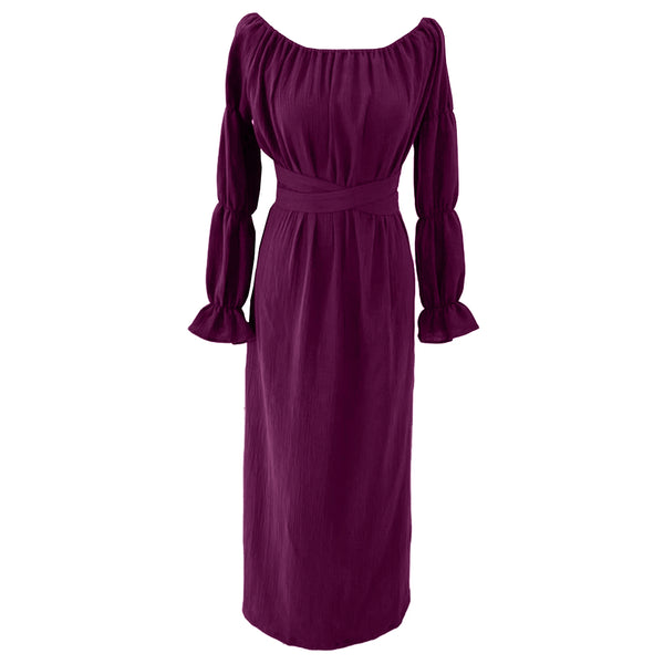 This long dress from Les vedettes has long layered puffed sleeves. The maxi dress comes with a belt. This Jolene dress comes in muslin cotton in the colour aubergine which is a mix of dark red and dark purple.  The dress has a round collar but can also be worn off shoulder.